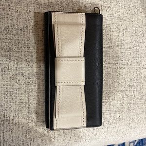 Kate Spade wallet never used.